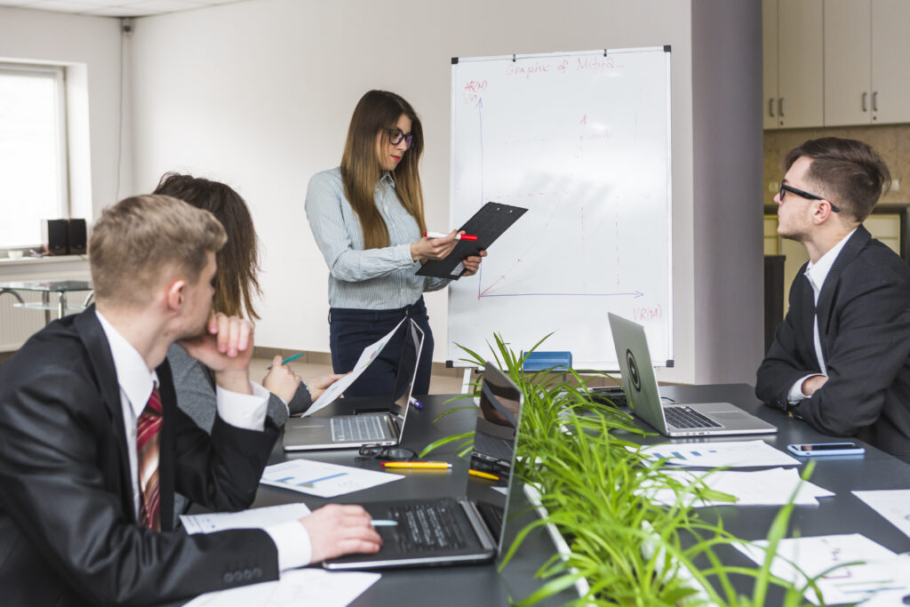 young businesswoman looking document board meeting